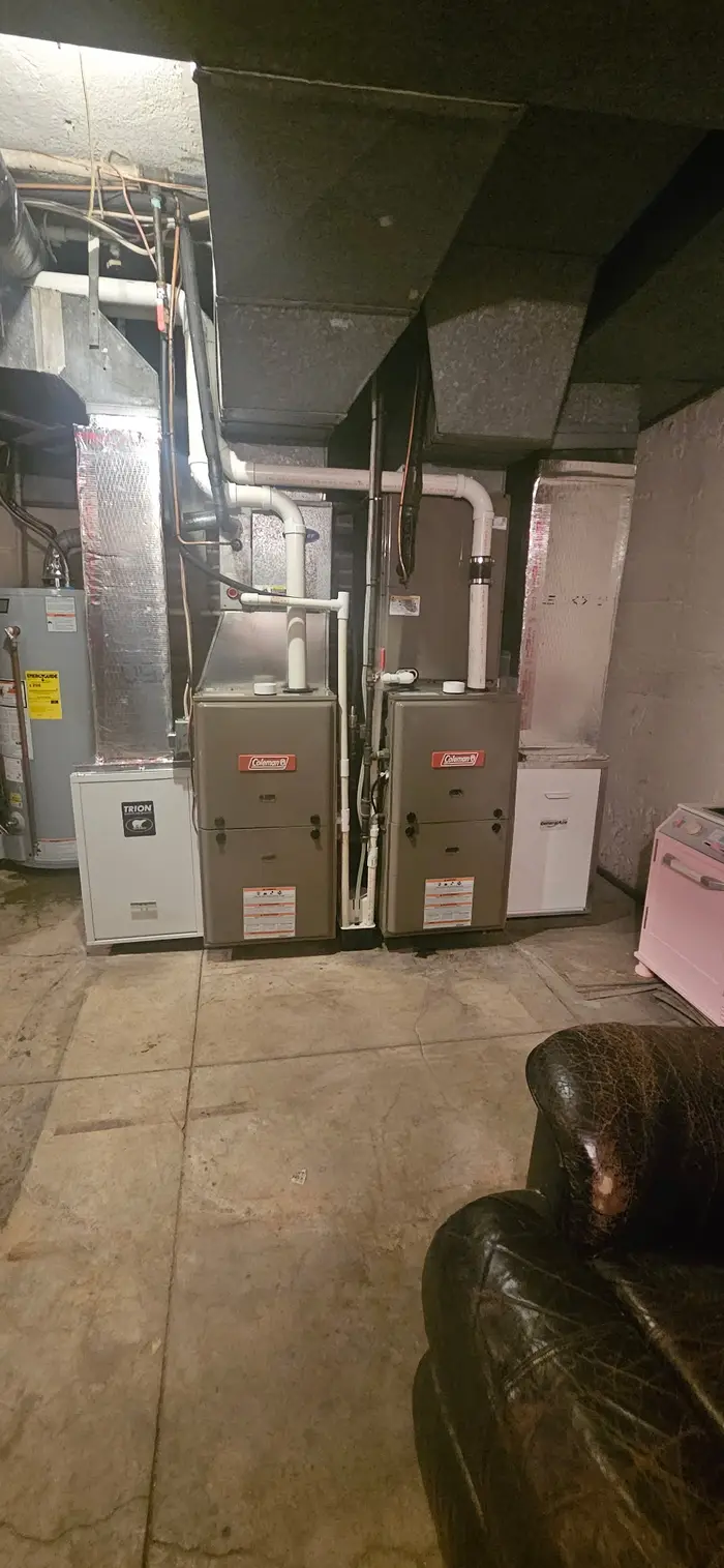 Dual Coleman furnace installation with Trion air filtration system in Terre Haute Indiana